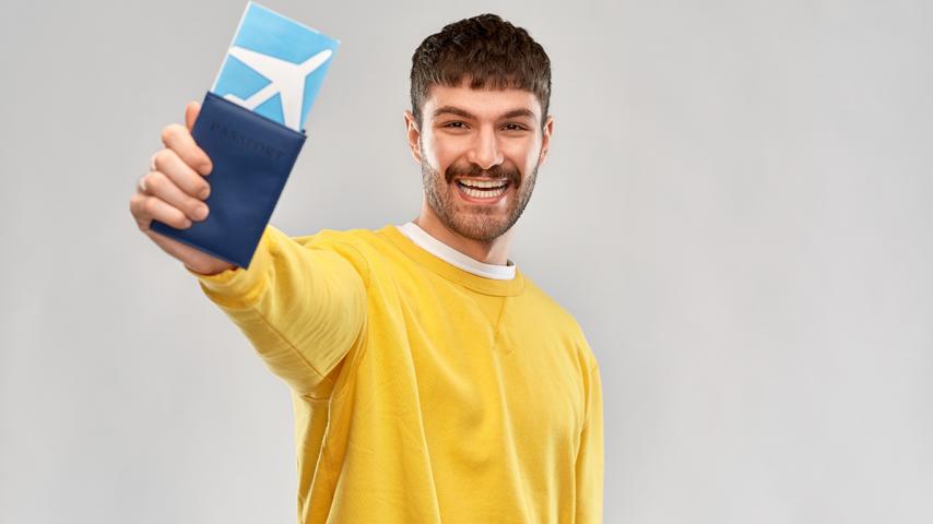Man showing his flight ticket